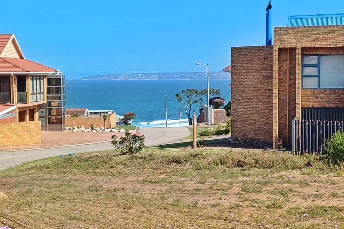 A scenic view of the ocean and coastline captured from the residential property, showcasing the surrounding neighbourhood and coastal landscape.