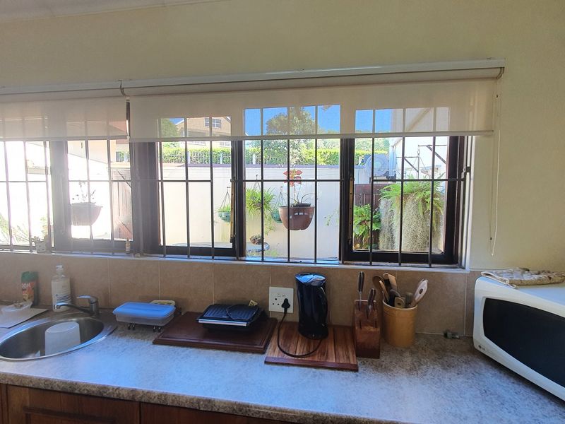 Coastal Investment Opportunity with Dual Living and Panoramic Sea Views - Photo 8