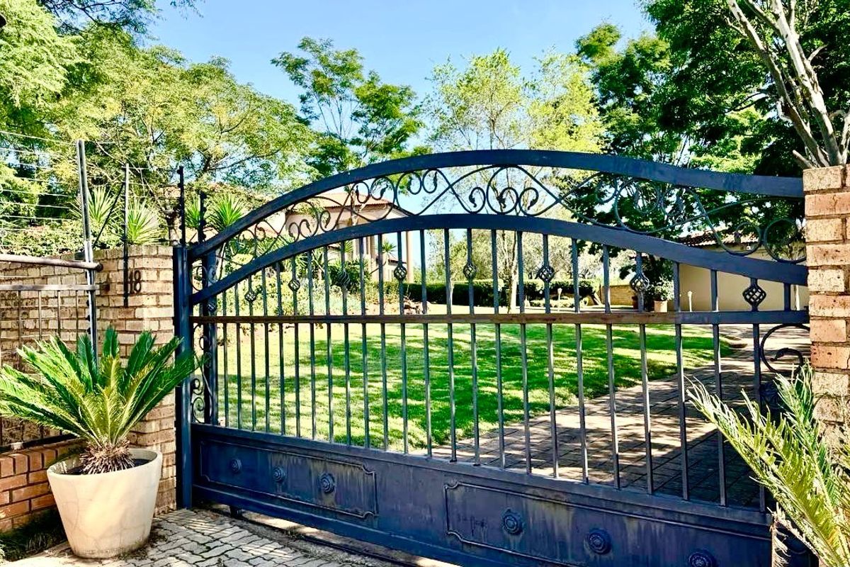 A Private Sanctuary of Space, Elegance & Self-Sufficiency in an Exclusive Estate - Photo 3