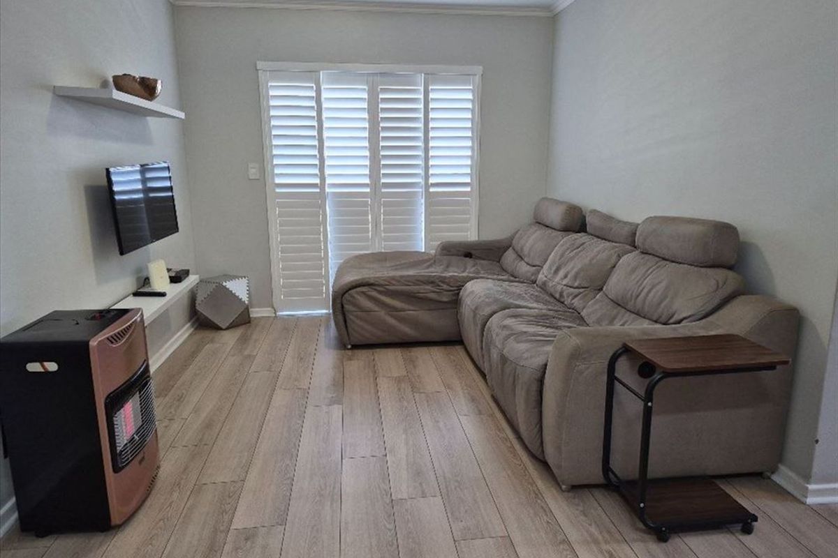 Charming Two-Bedroom Home with Pool and Secure Parking - Photo 2