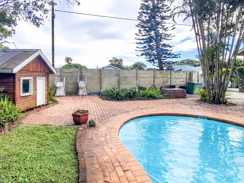 Family Ready Home with Generous Spaces and Central Convenience Awaits in Gonubie (By the Sea) - Photo 1
