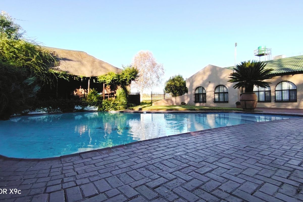 Established Riverfront Farm with Lawn Business, Flatlets & Water Rights - Photo 3