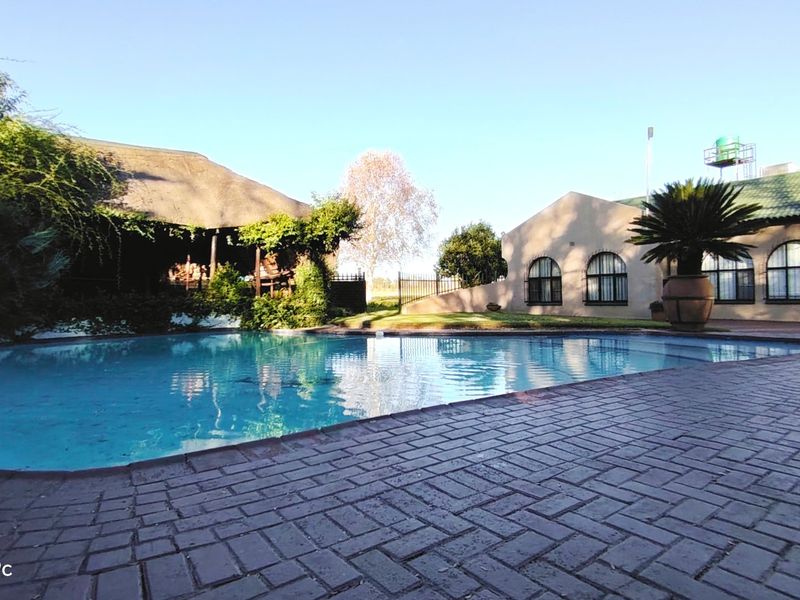 Established Riverfront Farm with Lawn Business, Flatlets & Water Rights - Photo 3