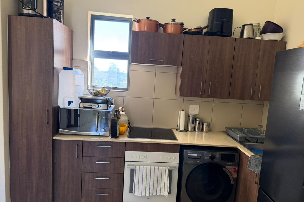 Modern 2-Bedroom Apartment in the Prestigious Jackal Creek Golf Estate - Photo 2