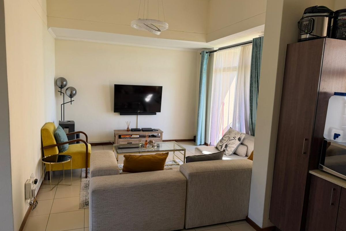 Modern 2-Bedroom Apartment in the Prestigious Jackal Creek Golf Estate - Photo 4