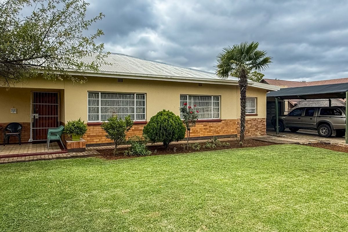 Solid Family Home with Spacious Living & Exceptional Outbuildings - Photo 4