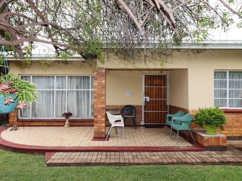 Solid Family Home with Spacious Living & Exceptional Outbuildings - Photo 1