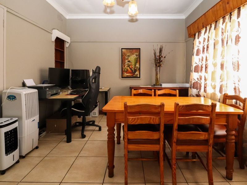 Solid Family Home with Spacious Living & Exceptional Outbuildings - Photo 8
