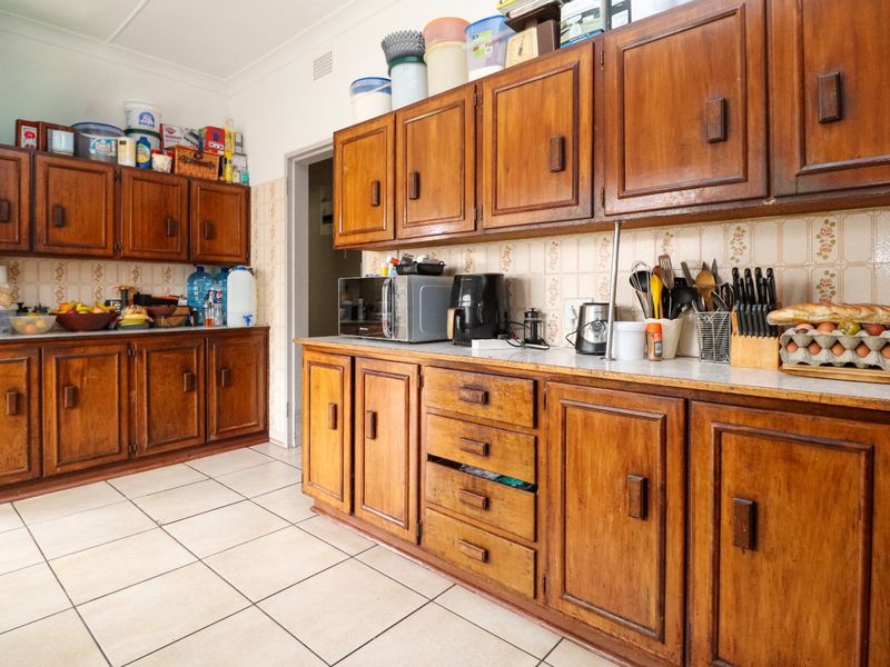 Solid Family Home with Spacious Living & Exceptional Outbuildings - Photo 9