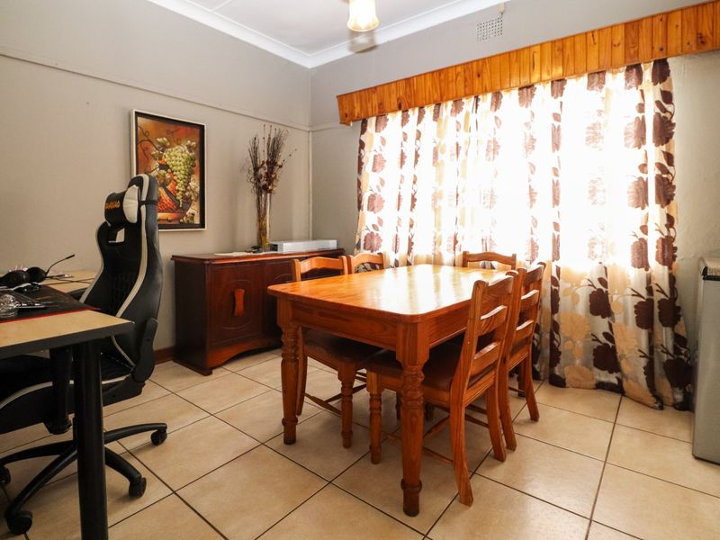 Solid Family Home with Spacious Living & Exceptional Outbuildings - Photo 7