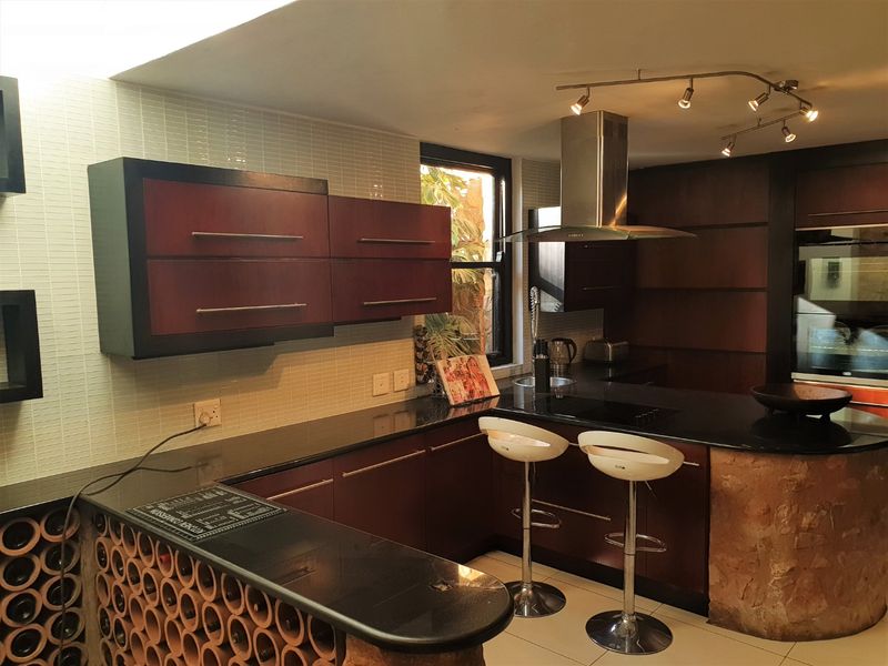 FURNISHED: Elegant 5 Bedroom home in Houghton - Photo 8