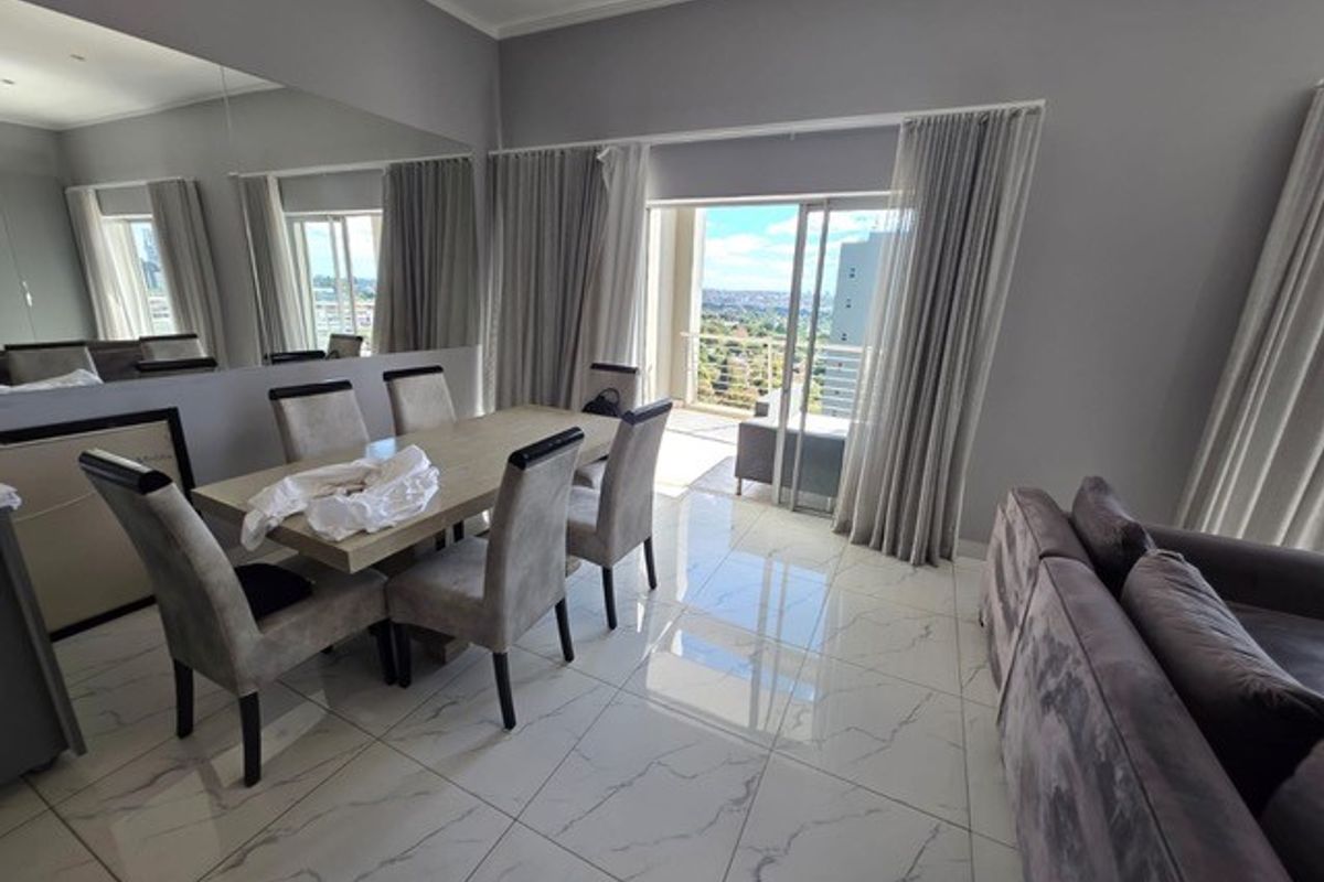 FURNISHED | Exclusive 3-Bedroom Duplex with Panoramic Sandton Views - Photo 2