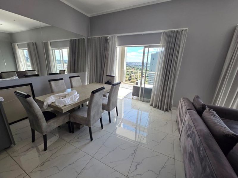 FURNISHED | Exclusive 3-Bedroom Duplex with Panoramic Sandton Views - Photo 2