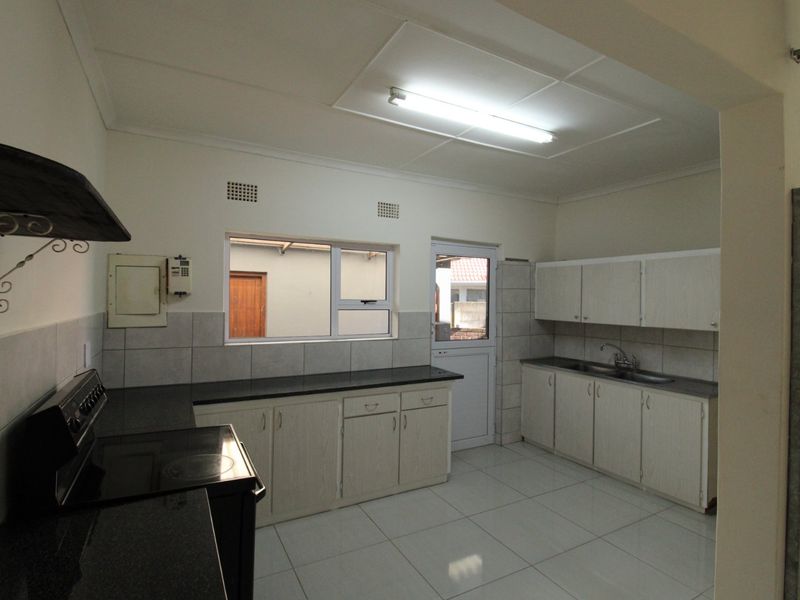 Stylish Family Home with Ocean Views and Granny Flat - Photo 6