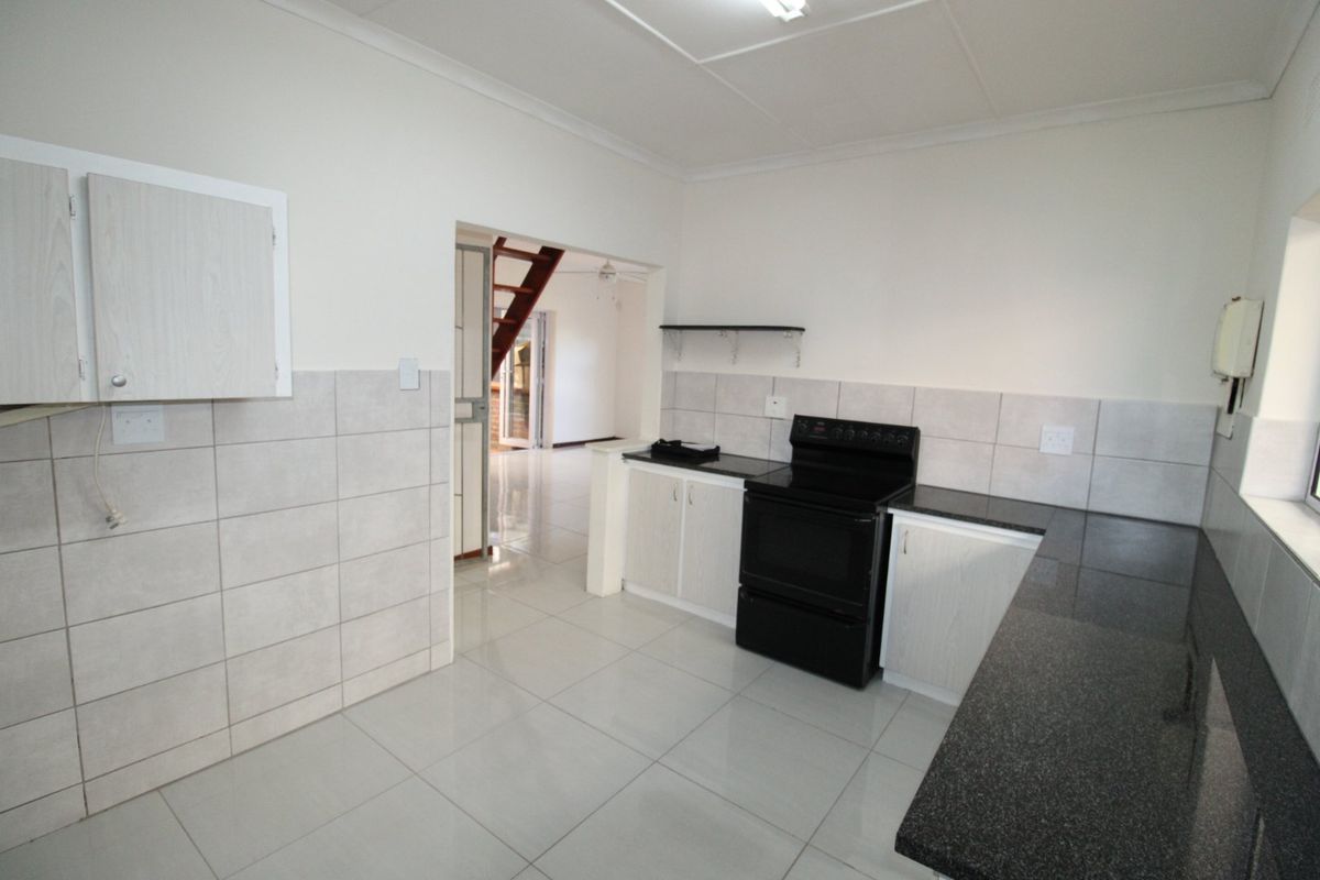 Stylish Family Home with Ocean Views and Granny Flat - Photo 5