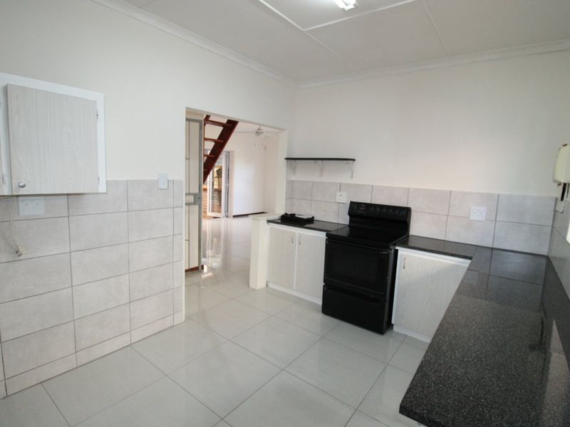 Stylish Family Home with Ocean Views and Granny Flat - Photo 5