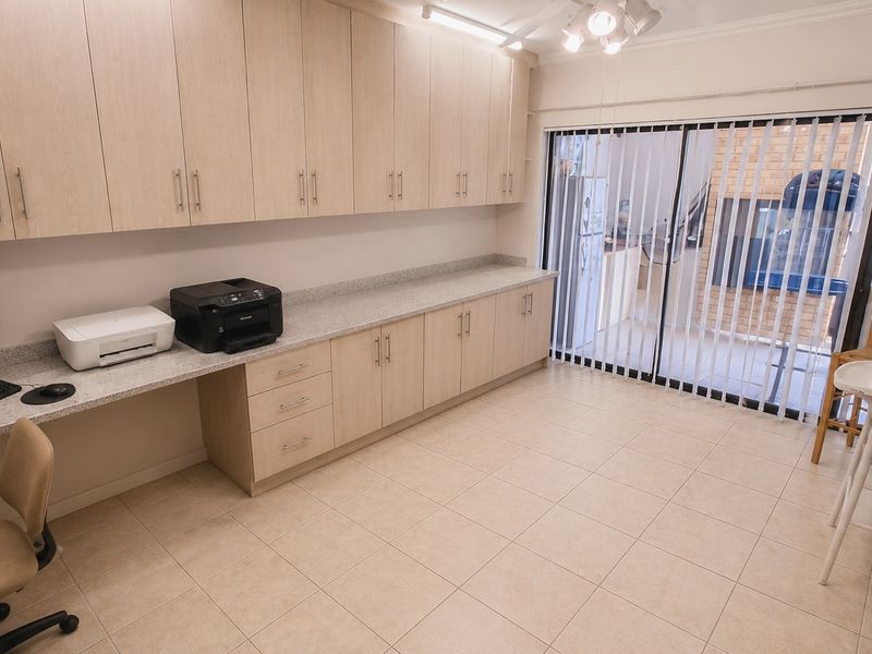 Spacious Lock-Up-and-Go Home in a Secure Complex with Double Garage, Double Carport, Solar and Borehole - Photo 10