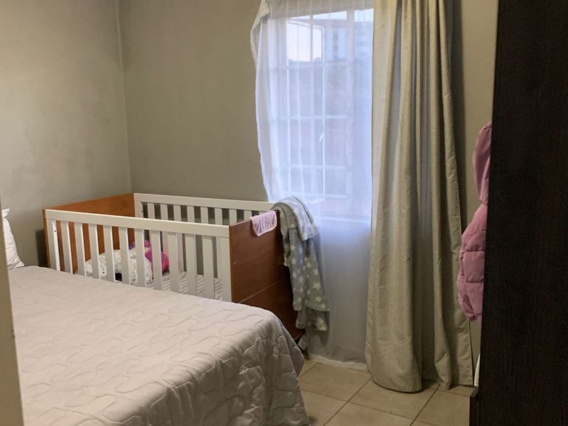 Welcome to this charming and secure 2-bedroom, 1-bathroom apartment - Photo 8
