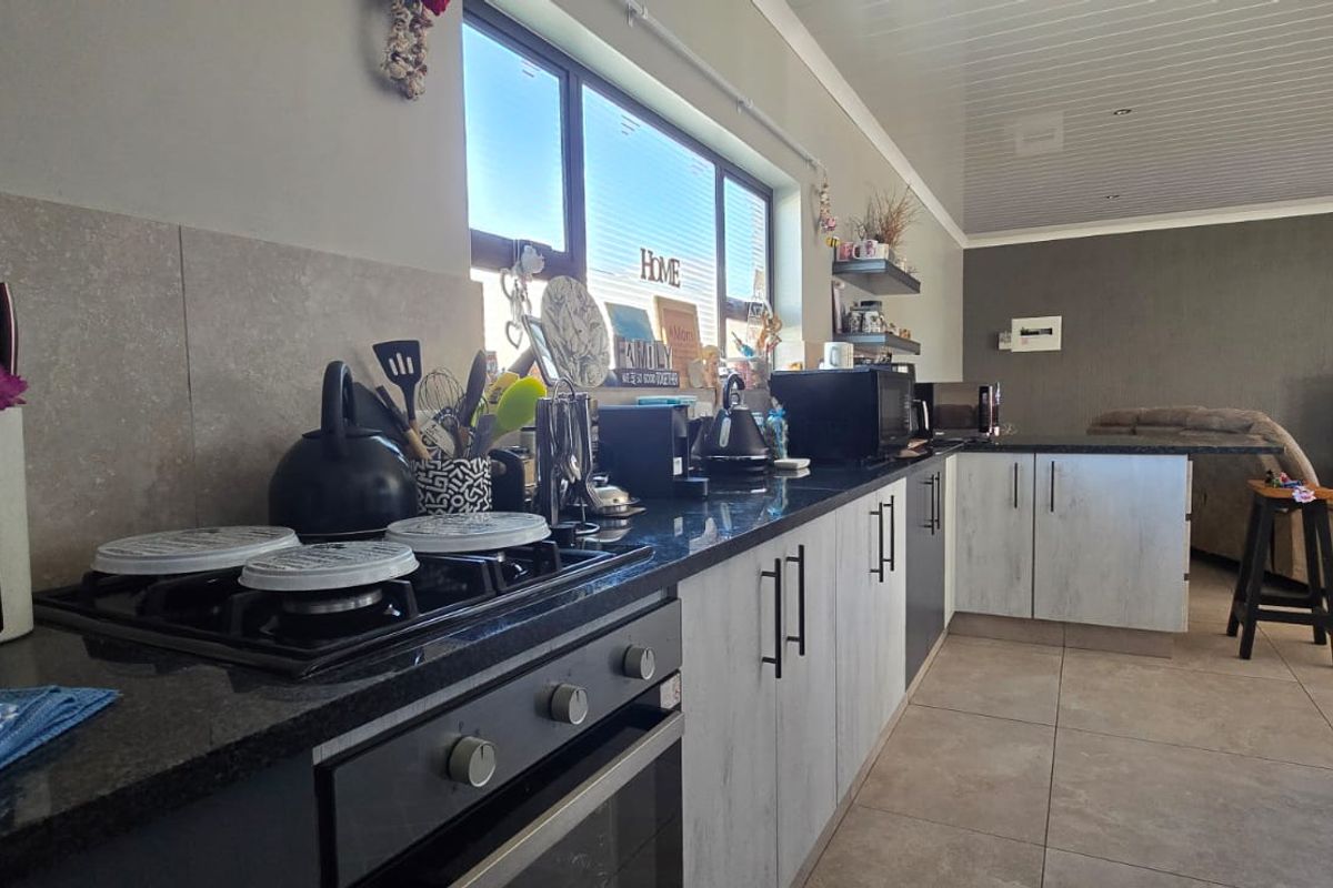 Come and experience secure estate living in this neat and spacious full-title townhouse. - Photo 3