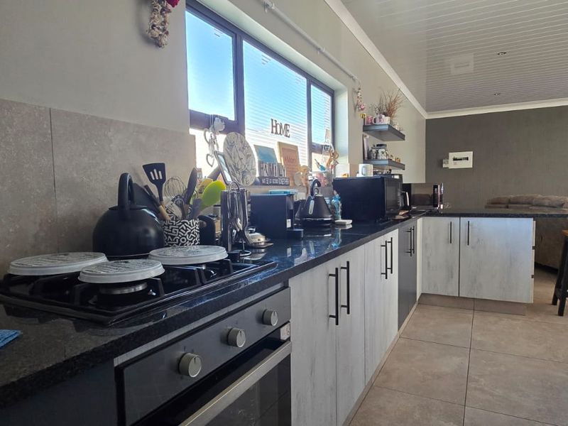 Come and experience secure estate living in this neat and spacious full-title townhouse. - Photo 3