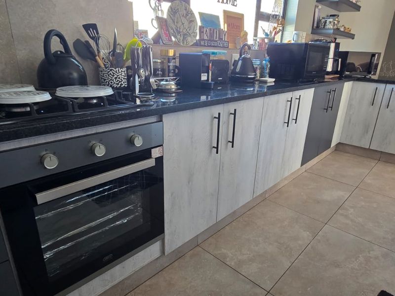 Come and experience secure estate living in this neat and spacious full-title townhouse. - Photo 4