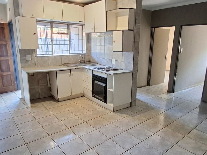 FIXER-UPPER LARGE HOUSE WITH FLAT FOR SALE IN ORCHARDS - Photo 8