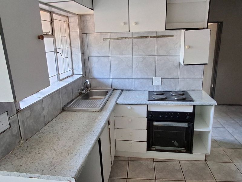 FIXER-UPPER LARGE HOUSE WITH FLAT FOR SALE IN ORCHARDS - Photo 7