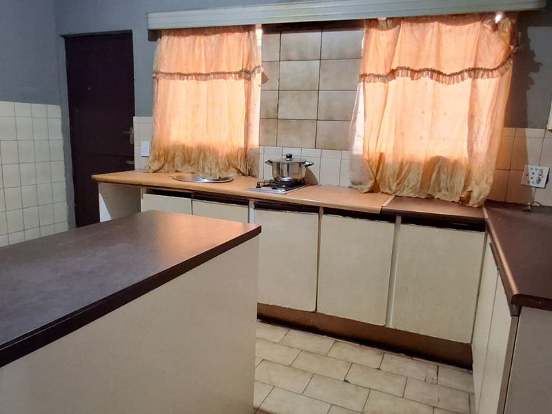 FIXER-UPPER LARGE HOUSE WITH FLAT FOR SALE IN ORCHARDS - Photo 6
