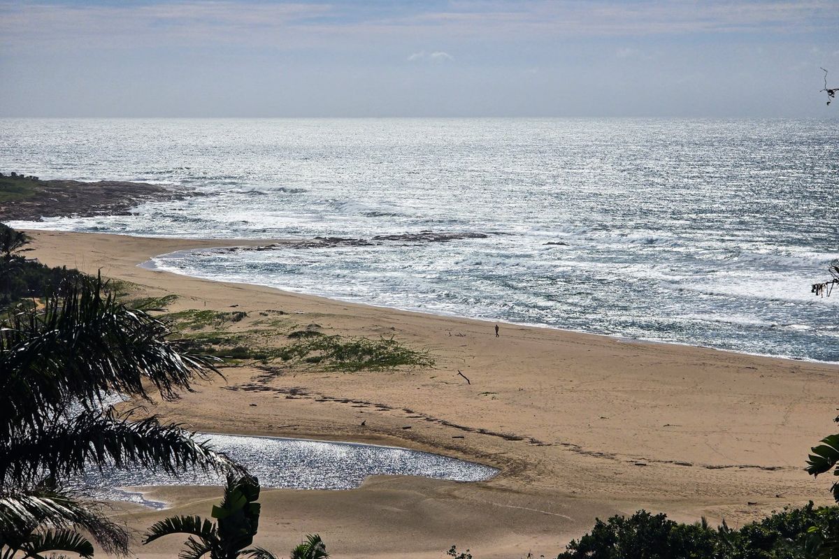 Rare Single-Level Home with River and Breaker Sea Views  - Photo 2