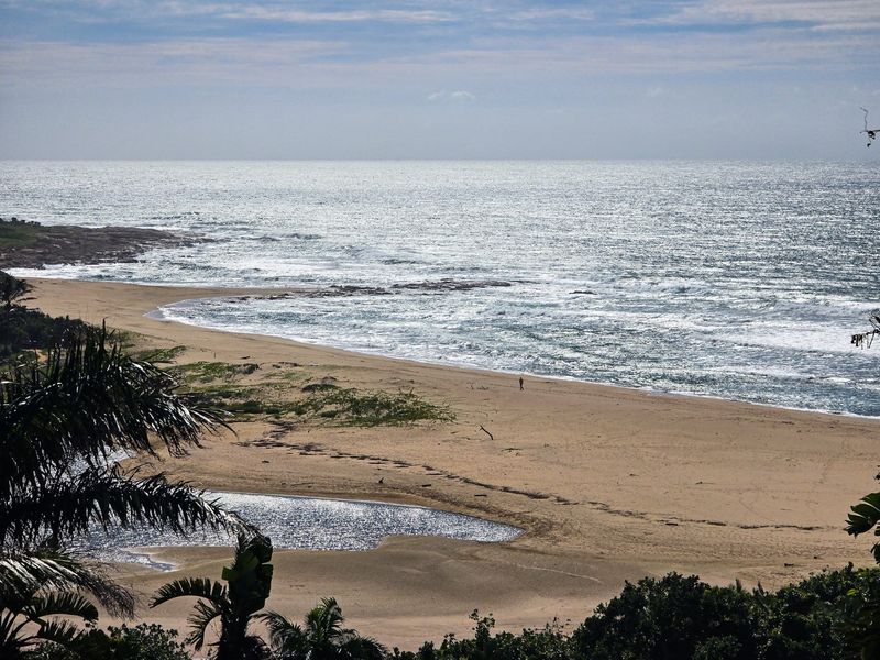 Rare Single-Level Home with River and Breaker Sea Views  - Photo 2