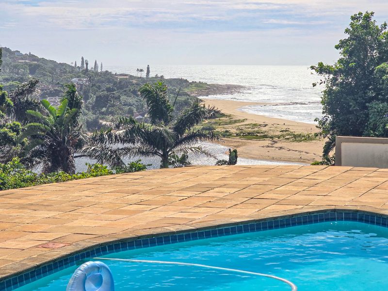 Rare Single-Level Home with River and Breaker Sea Views  - Photo 1