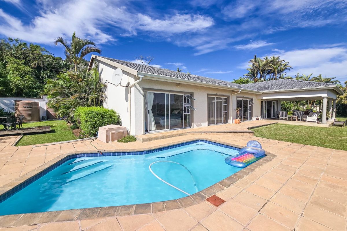 Rare Single-Level Home with River and Breaker Sea Views  - Photo 3