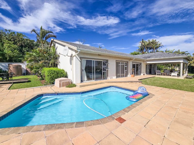 Rare Single-Level Home with River and Breaker Sea Views  - Photo 3