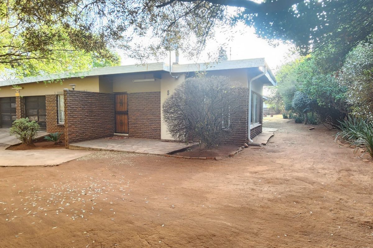 CORNER PROPERTY WITH ALOT OF POTENTIAL FOR DEVELOPMENT - Photo 2