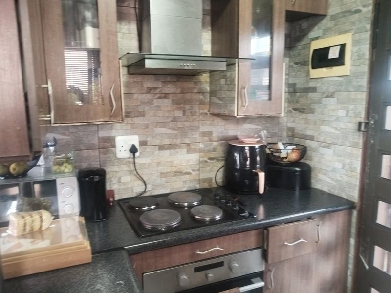 NEAT & SECURE 2 BEDROOM HOME FOR SALE - Photo 1