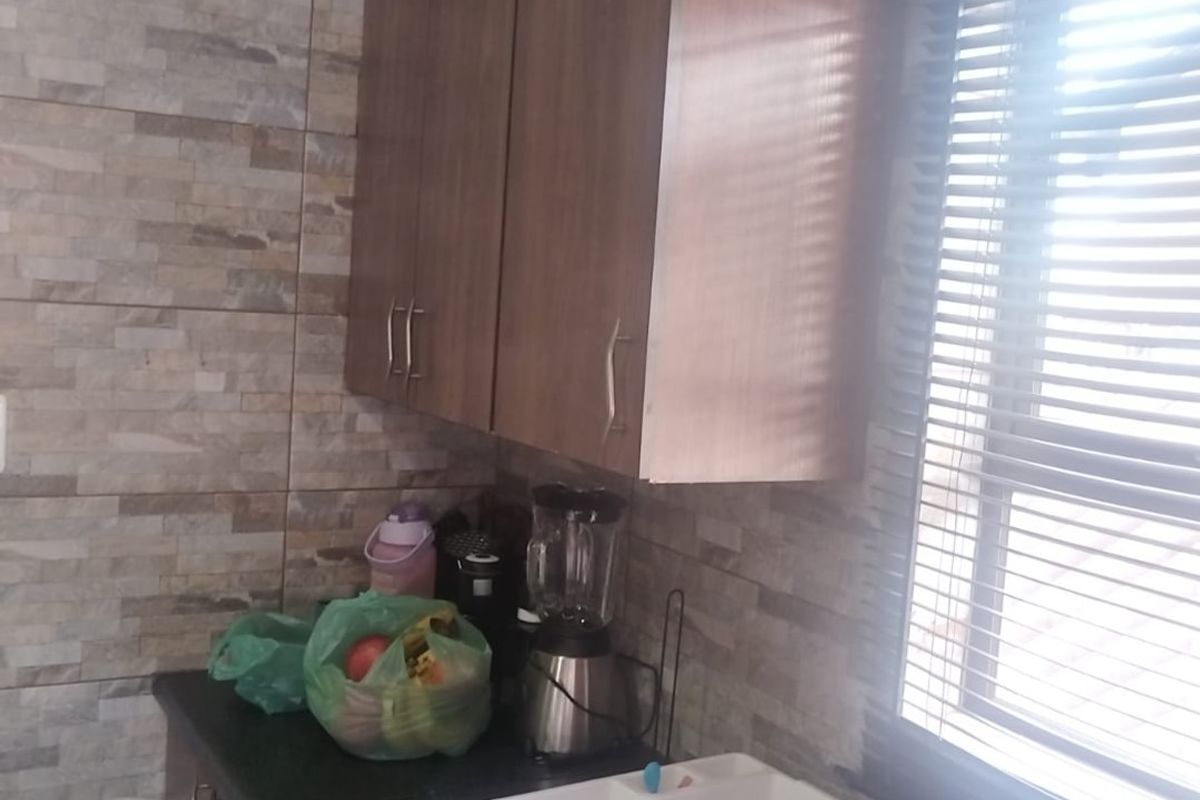 NEAT & SECURE 2 BEDROOM HOME FOR SALE - Photo 3