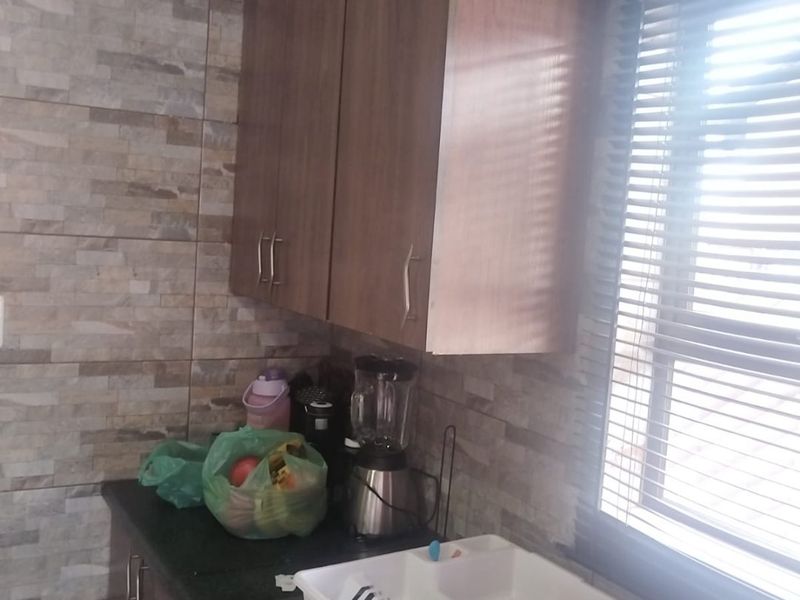 NEAT & SECURE 2 BEDROOM HOME FOR SALE - Photo 3