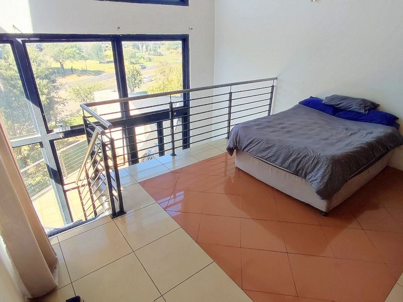 Modern Loft-Style Apartment with Stunning Views in Rooihuiskraal North - Photo 8