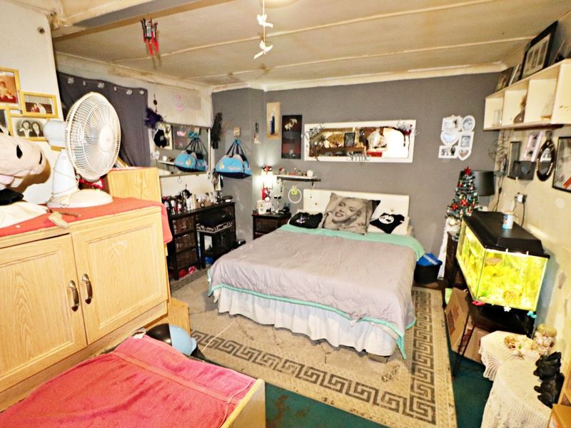 Spacious Family Home on a Large Stand with Endless Potential - Photo 10