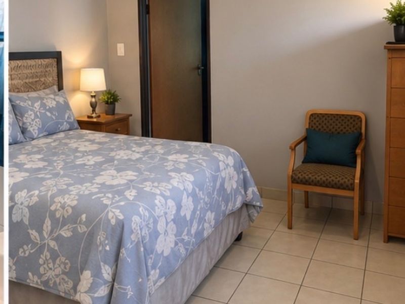 A functional bedroom featuring neutral wall paint, tiled flooring, and classic cove cornicing, providing a clean and simple living space.