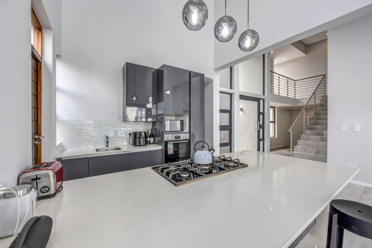 Modern Double-Story Home | 3 Bed | 3 Bath | High Ceilings & Expansive Glass | Jackal Creek Golf Estate | Fairway Views - Photo 4