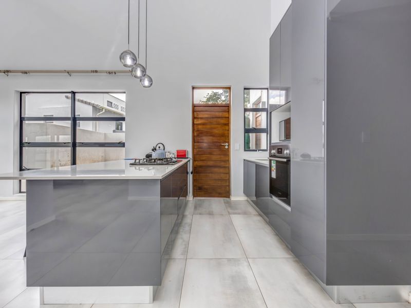 Modern Double-Story Home | 3 Bed | 3 Bath | High Ceilings & Expansive Glass | Jackal Creek Golf Estate | Fairway Views - Photo 2