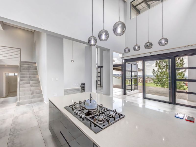 Modern Double-Story Home | 3 Bed | 3 Bath | High Ceilings & Expansive Glass | Jackal Creek Golf Estate | Fairway Views - Photo 6