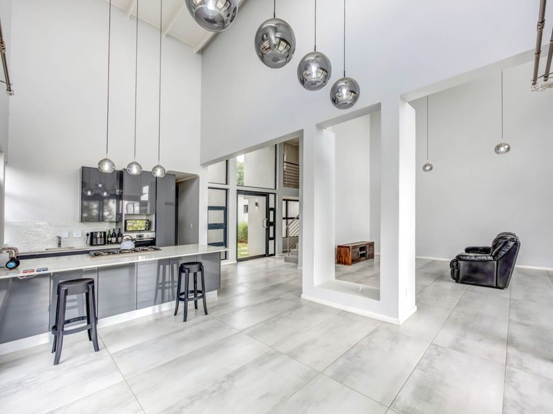 Modern Double-Story Home | 3 Bed | 3 Bath | High Ceilings & Expansive Glass | Jackal Creek Golf Estate | Fairway Views - Photo 5