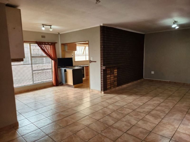 Elegant Family Home with Spacious Living Areas - Photo 1