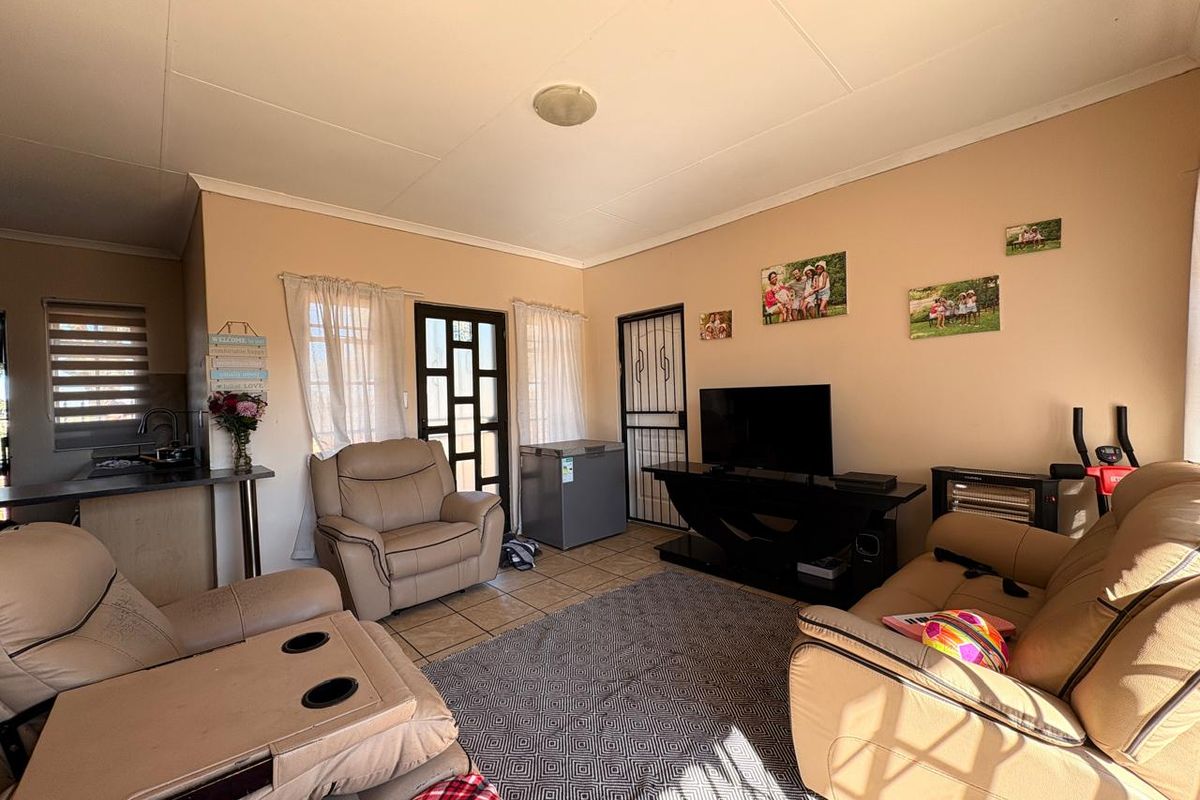 Low-maintenance 2-bedroom facebrick home with a built-in braai, modern finishes, prepaid electricity, and excellent security in Stilfontein Extension 4. - Photo 4