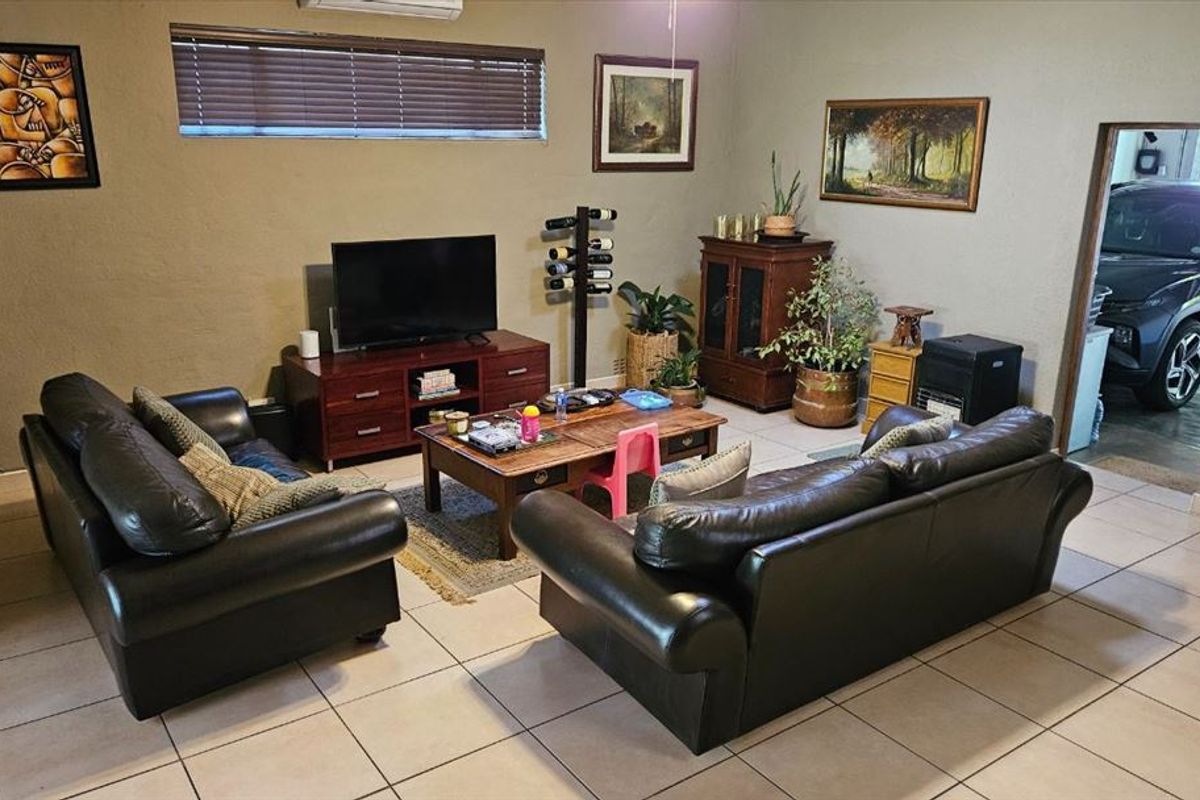 Elegant Family Home with Spacious Living Areas - Photo 2