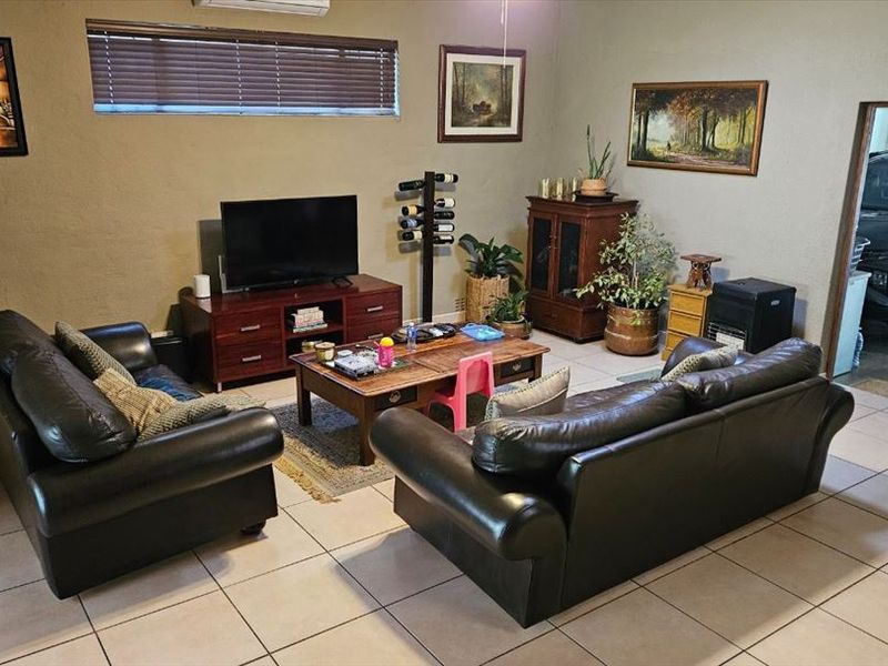 Elegant Family Home with Spacious Living Areas - Photo 2
