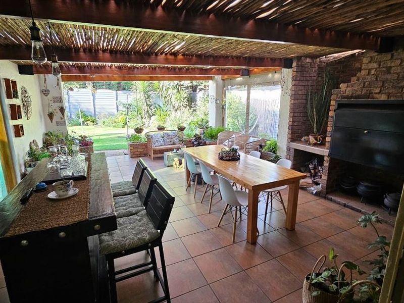 Elegant Family Home with Spacious Living Areas - Photo 1