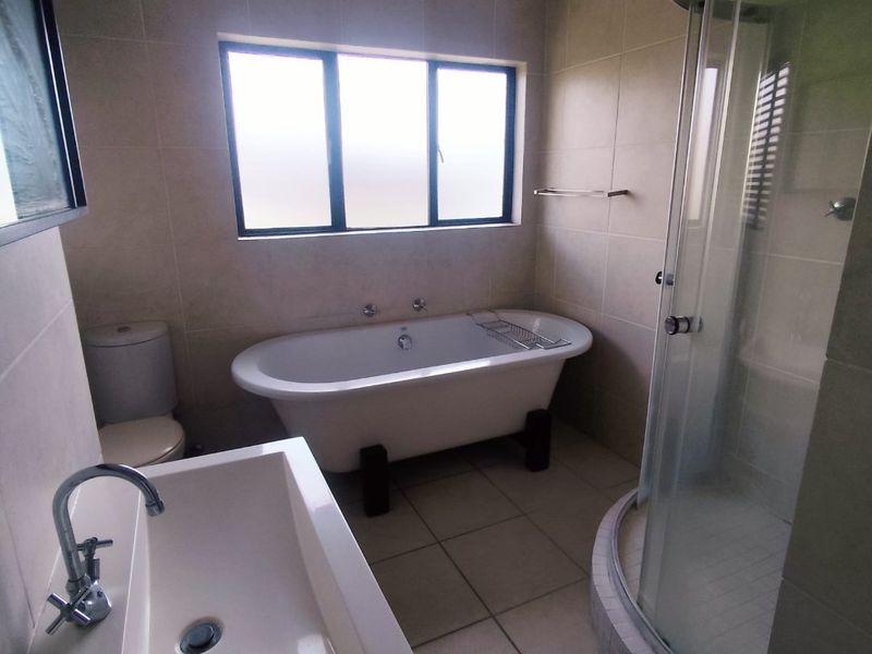 SECURE 2-BEDROOM PET-FRIENDLY APARTMENT WITH MAIN EN-SUITE, COMMUNAL POOL, AND 24-HOUR SECURITY - Photo 7